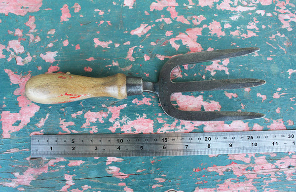 A Vintage Steel Hand Fork with Turned Beech Wood Handle