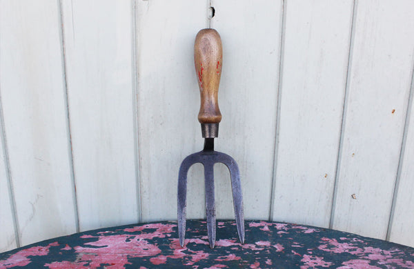 A Vintage Steel Hand Fork with Turned Beech Wood Handle