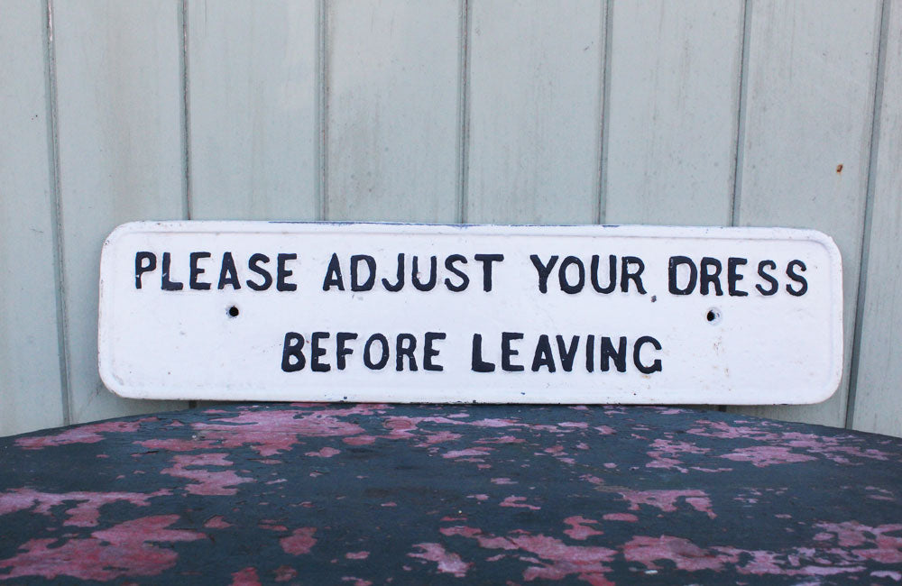 A Cast Iron Victorian Sign