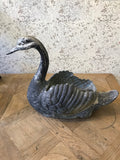 A well modelled vintage painted aluminium swan planter. High 39cm Length 54cm. £340.