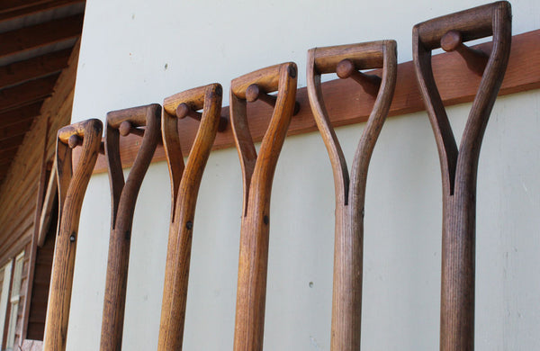 A Rack of 6 Vintage Spades and Forks
