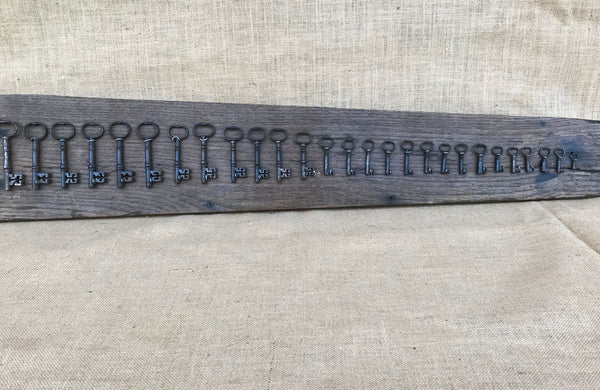 A Group of 27 Graduated Georgian Steel Keys