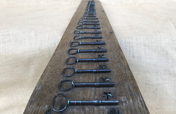 A Group of 27 Graduated Georgian Steel Keys