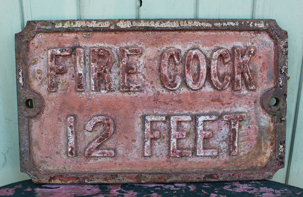 A Victorian Cast Iron Sign "Fire Cock 12 Feet"