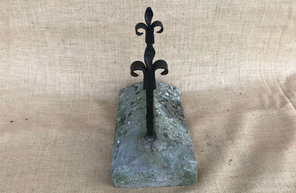 A Victorian Wrought Iron boot Scraper with Fleur de Lys Scrolls