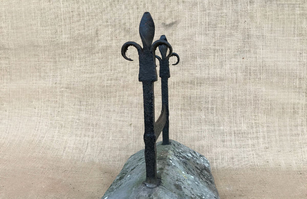 A Victorian Wrought Iron boot Scraper with Fleur de Lys Scrolls