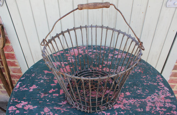 A Vintage Potato Basket with Wooden Handel