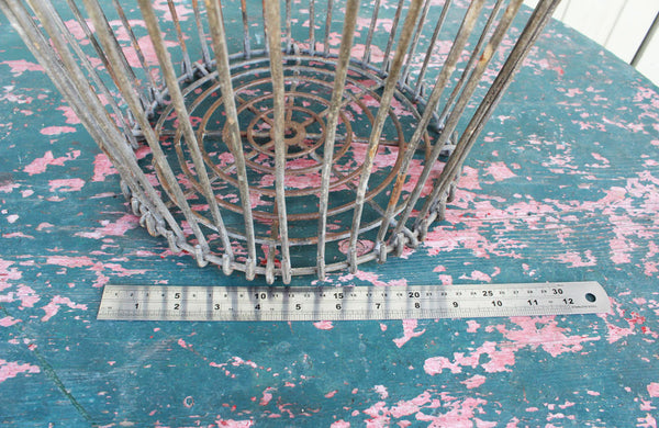 A Vintage Potato Basket with Wooden Handel