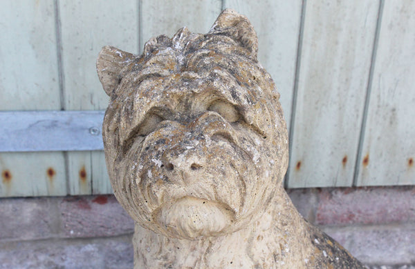 A Reconstituted Stone Figure of a West Highland Terrier Dog