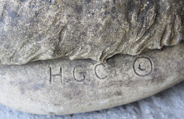 A Reconstituted Stone Figure of a West Highland Terrier Dog