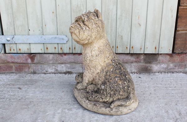 A Reconstituted Stone Figure of a West Highland Terrier Dog