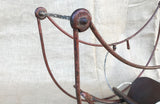 A Vintage Metal Child’s Double Rocker by Triang