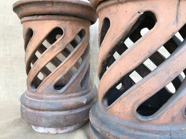 A Pair of Antique Terracotta Chimney Pots with Removable Lids