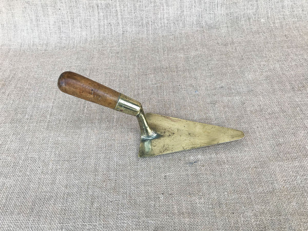 A French brass trowel
