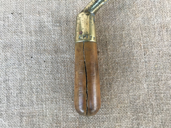 A French brass trowel