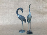 A pair of vintage spelter cranes