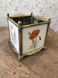 A late Victorian Minton tile and cast brass cache pot or planter.