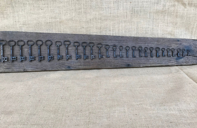 A Group of 27 Graduated Georgian Steel Keys