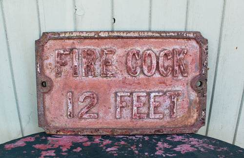 A Victorian Cast Iron Sign "Fire Cock 12 Feet"