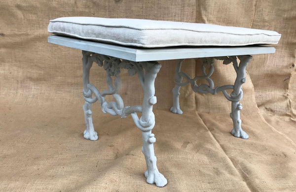 A Bench made from Antique Bench Ends Cast with Trees, Serpents & Acorns