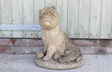 A Reconstituted Stone Figure of a West Highland Terrier Dog