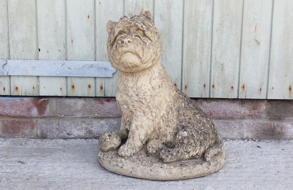 A Reconstituted Stone Figure of a West Highland Terrier Dog