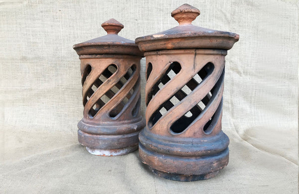 A Pair of Antique Terracotta Chimney Pots with Removable Lids